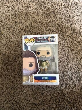Funko Gold and Gray Zeus Pop! Figure